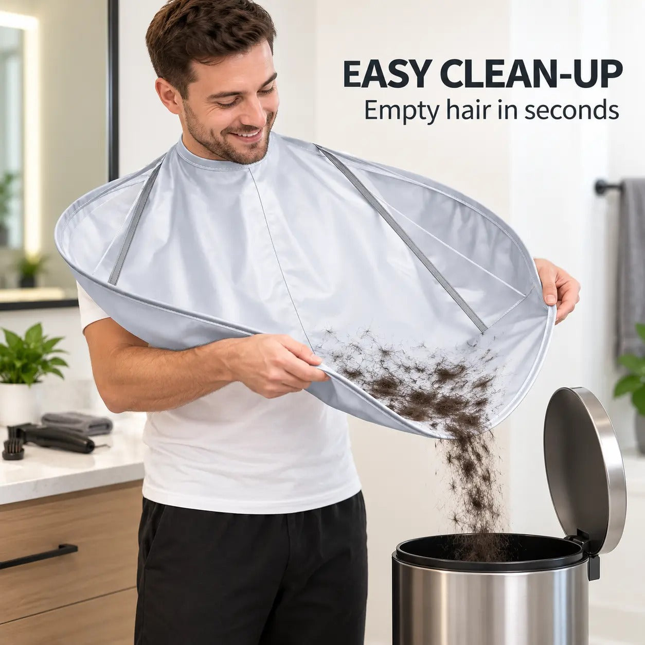 Hair clippings being emptied from the haircut cape