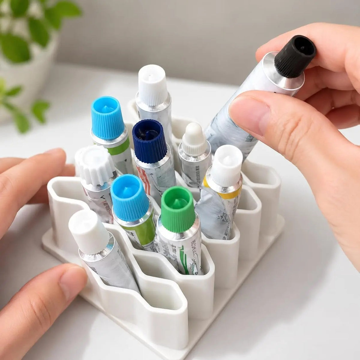 individual storage slots holding small art supplies