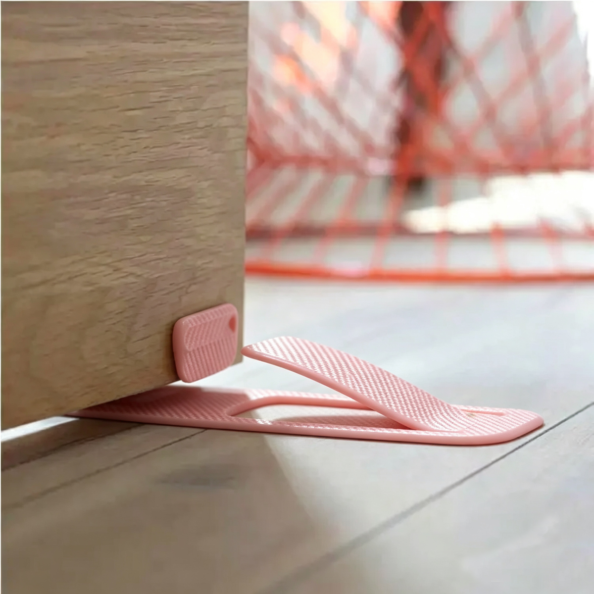 🦶Spring-loaded innovative doorstop - securely holds open door wedges in place