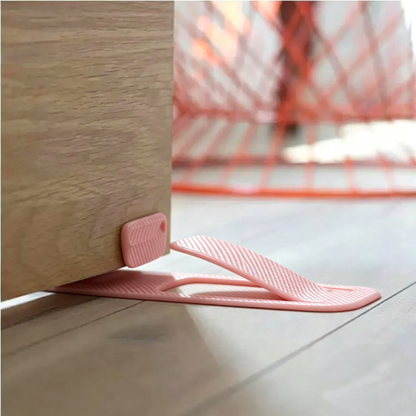🦶Spring-loaded innovative doorstop - securely holds open door wedges in place