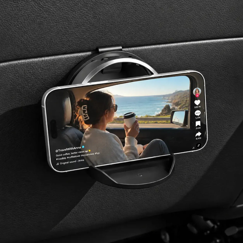 Smartphone resting horizontally in foldable car holder