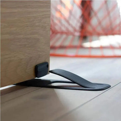 🦶Spring-loaded innovative doorstop - securely holds open door wedges in place