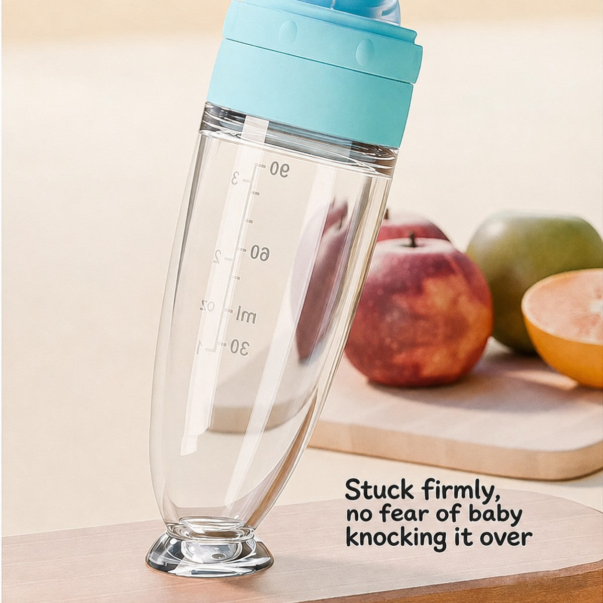 Baby food dispenser standing upright on suction base