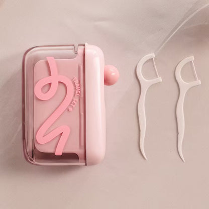 🌟Travel-sized storage case - features an automatic pop-up dispenser