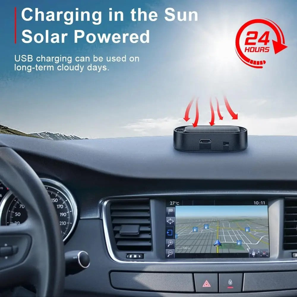 Solar powered car alarm warning light charging on vehicle dashboard