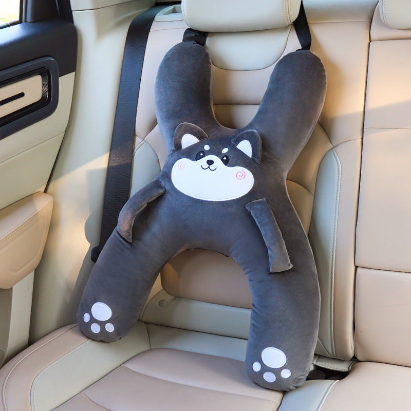 Husky kids travel pillow attached to vehicle headrest with adjustable straps